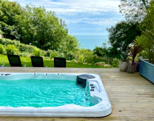 Niton Apartment | Relaxing private entrance ensuite room with stunning sea view and swimspa