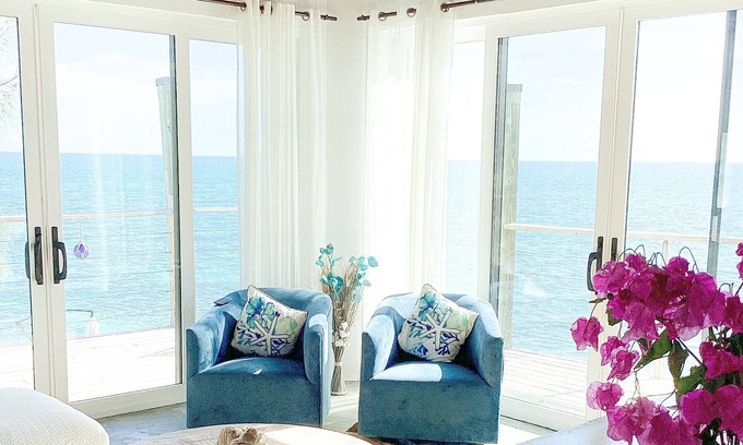 Rainbow Bay House | Remodeled Oceanfront Cottage Directly on the Warm Calm Caribbean