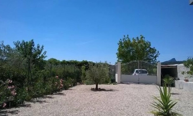 Fontanes House | Renovated contemporary style house in small village, view of Pic Saint Loup