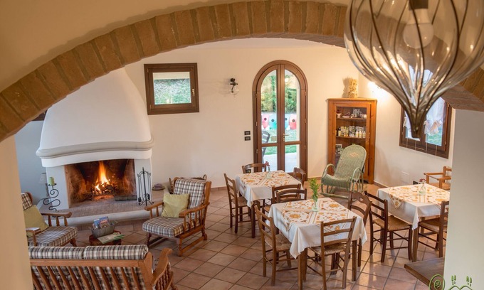 Oriolo dei Fichi Villa | Renovated farmhouse with swimming pool and large garden.
