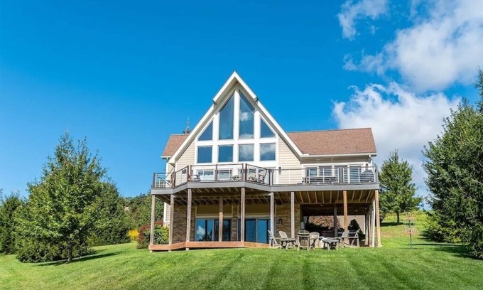 Waterfront Greens House | Renovated Home with great VIEWS! Boat dock, hot tub, dog friendly, golf course.