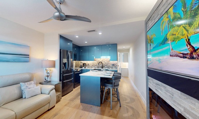 Sunset Beach Condo | Renovated Sunset Beach Waterfront Condo with Water Views, Pool, Fishing Dock & Beach Access.