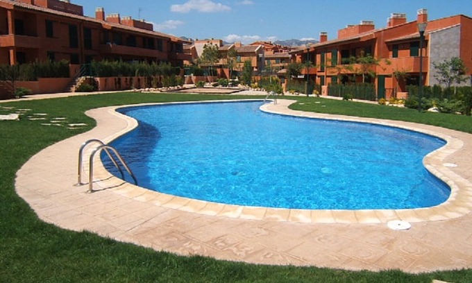 L Almadrava Apartment | Residential apartment on ground floor with garden and direct access to the swimming pool.