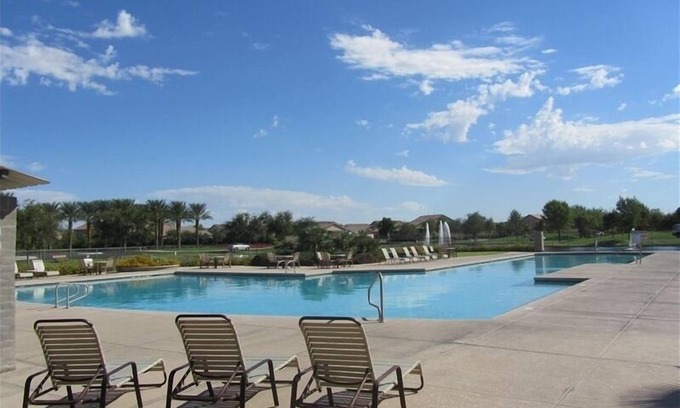 Maricopa House | Resort Home with 2 Pools, Putting Green, Fire-Pit, Water Feature, & Pergola.