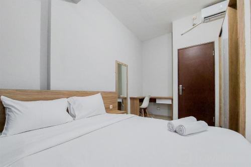 Jakarta Apartment | Restful and Modern 2BR Majestic Point Serpong Apartment By Travelio