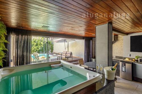 Ponta do Papagaio House | Retiro Luxo - Piscina & Jacuzzi