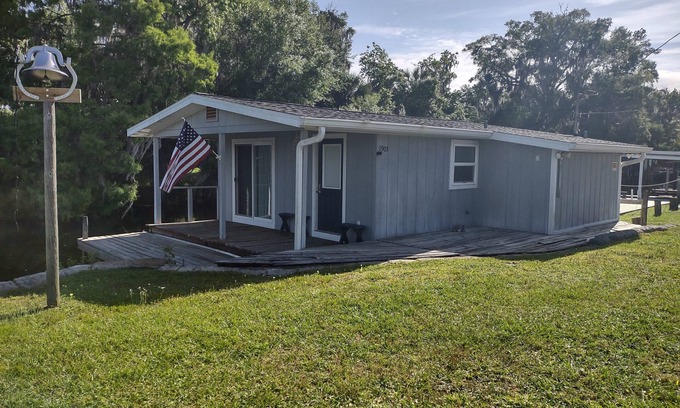 Dillard Estates Cottage | River front on the canal. Dock your boat at your deck porch.
