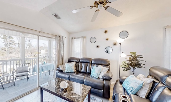 Carolina Forest Condo | River Oaks Resort condo with hot tub, pool, fairway views, tennis, balconies.