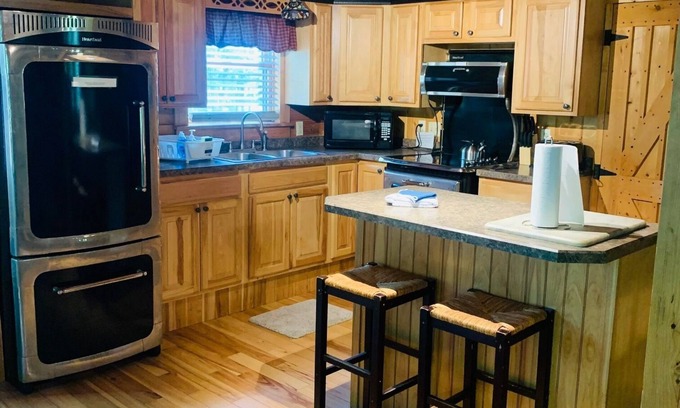 Elkins Cabin | RIVERFRONT 2 STORY, 4 BR, 2 Bath, Washer/Dryer, HOT TUB, Pet Friendly