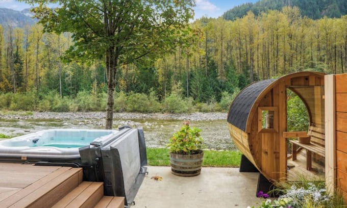 Baring Cabin | Riverfront A-Frame w/Hot Tub Near Stevens Pass Pet-Friendly Retreat