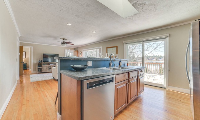 Cheboygan House | Riverfront Cheboygan Home w/Deck & Boat Dock!