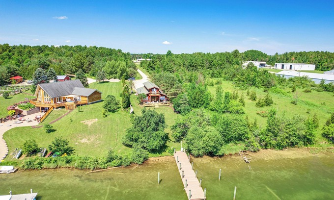 Cheboygan House | Riverfront Cheboygan Home w/Dock ~ 4 Mi to Town!