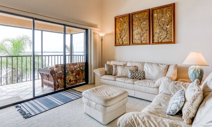 North Fort Myers Condo | Riverfront condo with tennis courts, screened patio & washer/dryer