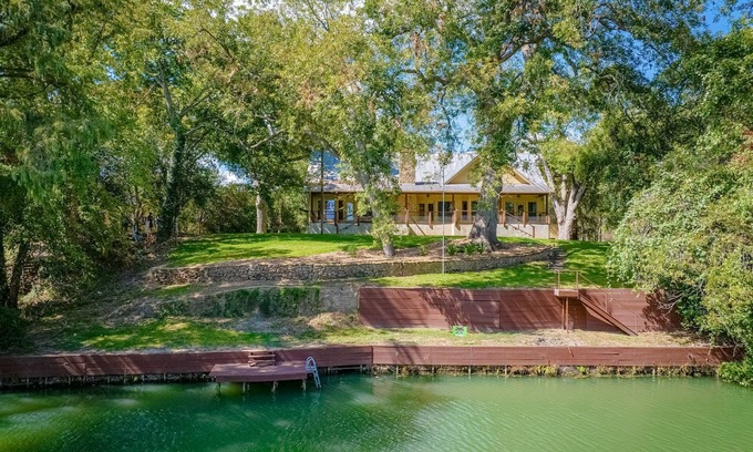 Seguin House | Riverfront home on Lake Seguin with dock, kayaks, beautiful views & air hockey
