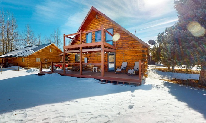Rivers Edge House | Riverfront home with river & valley views, wood stove, deck, & W/D