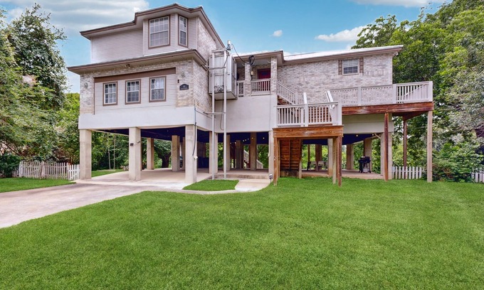 Seguin House | Riverfront retreat w/wraparound deck, gas grill, free WiFi, & central AC