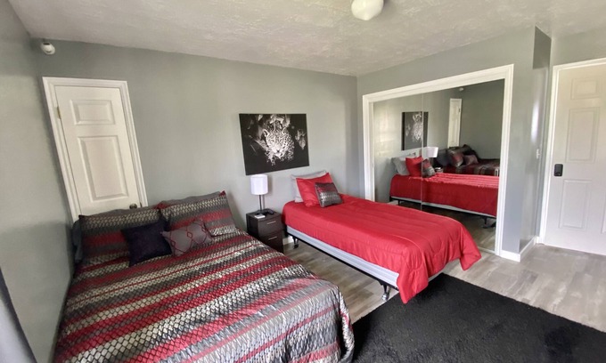 Emery County House | Rm #2. 1 double bed, 1 single bed smart TV, street/mountain view.
