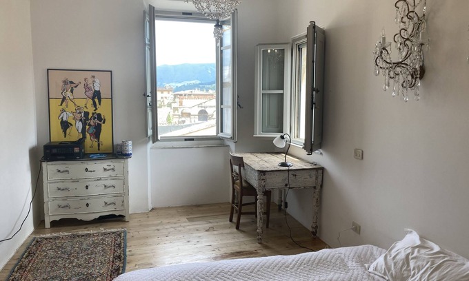 Foligno Apartment | Rooftop apartment on medieval piazza
