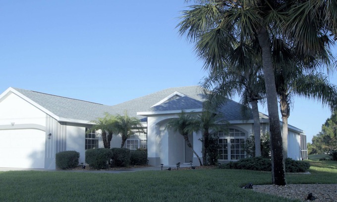 White Marsh House | Rotonda West 3 bed/3 bath Home with serene Lake View from your private pool deck