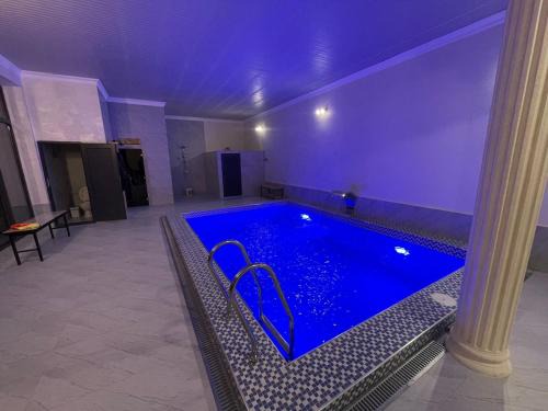 Shymkent House | Royal Pool Cottage