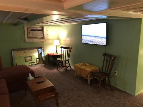 Cottage Line Apartment | Rustic BEACH FRONT Basement Apt, Pet Friendly Wi-Fi apts