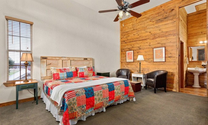 New Braunfels House | Rustic Elegance with King Size Comfort – Charming Suite with Shared Pool, Covered Porch & Lawn Views
