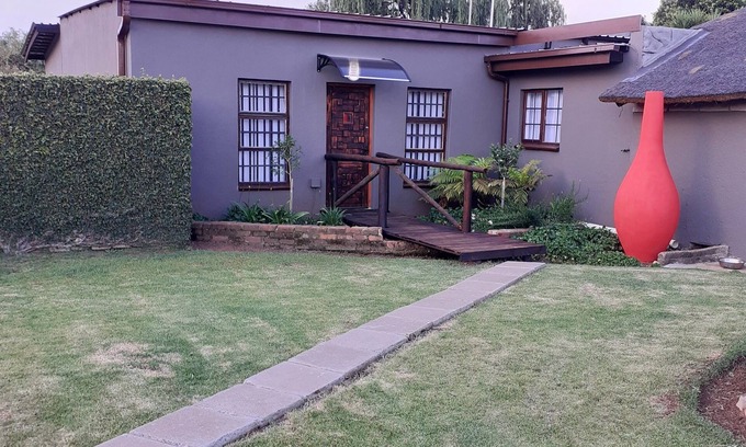 Benoni House | Rustic Red Self catering country life close to OR Tambo International