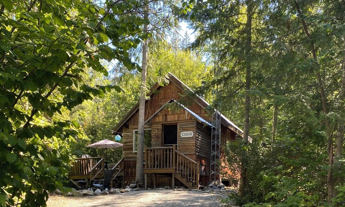 Mara Cabin | Rustic Solar cabin in the woods off grid glamming at its finest near Mara lake