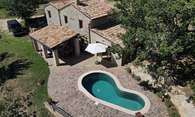 Civitella Casanova House | Rustic stone house with a modern touch