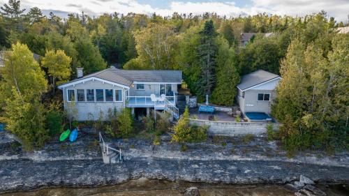 Lion's Head House | Rustic Waterfront Cottage W Hot Tub