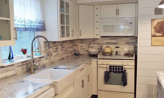 Hesston House | Sandy's Lake Chateau - Beautifully updated home on 3 private acres.