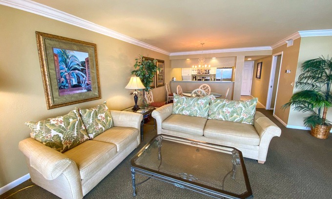 Punta Rassa Condo | Sanibel Harbour Resort Harbour Tower 315: Relaxing while watching for dolphins in the water below.