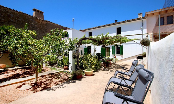 Pina House | Sant Coste House, charming village house with pool and garden