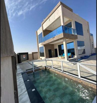 Al Hadd Ski Chalet | Santorini chalet شاليه سانتوريني