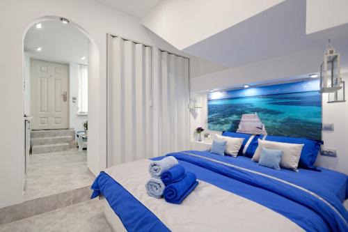 Mousio Apartment | Santorini Style in Athens, Greece