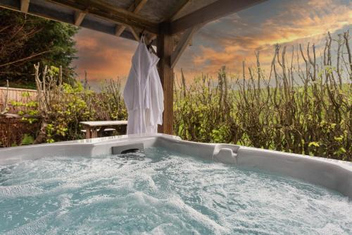 Workington House | Scenery Hill Hideaways The Coach House Charming Retreat with Jacuzzi and BBQ Hut Near the Lake District