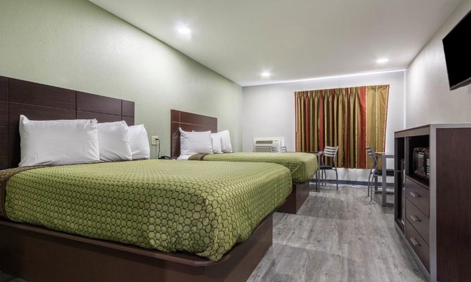 Tomball Hotel | Scottish Inn and Suites Tomball