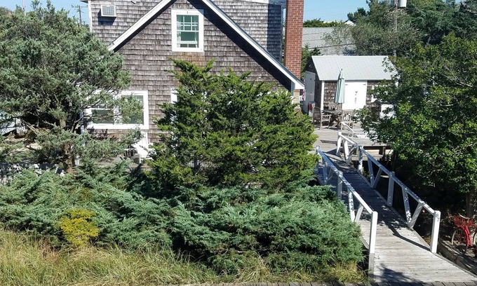 Fair Harbor House | Seashore Cottage charm, large deck on 2 lot private ‘‘Preserve,” 300’ from ocean