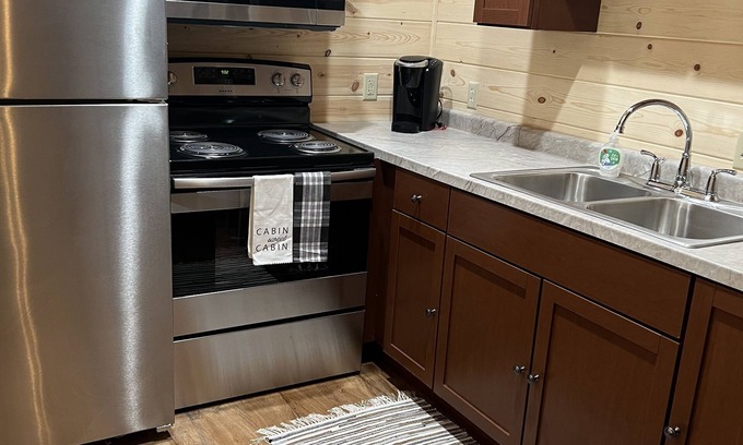 Logan Cabin | Secluded and close to all attractions. No cleaning fees!