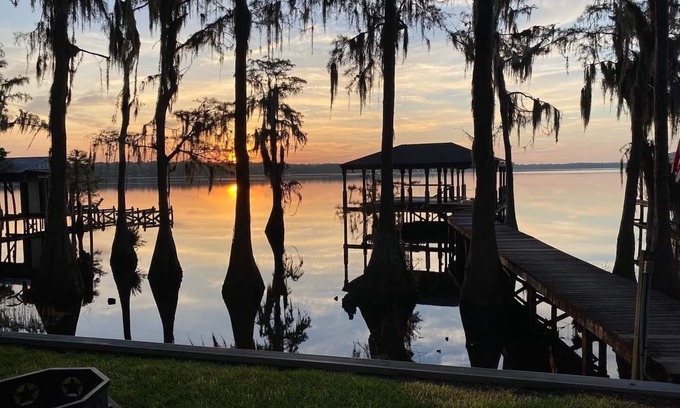 Clermont House | Secluded lake front w/private dock, boat lift, large screened porch