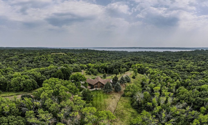 Yankton Cabin | Secluded Lake View Log Cabin on 40 Acres