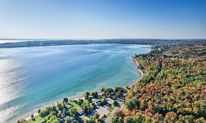 Suttons Bay Cottage | Secluded Suttons Bay Retreat w/Fire Pit!