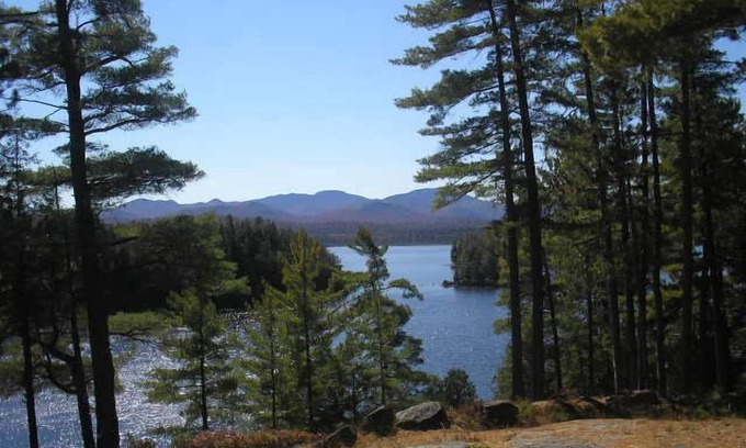 Saranac Lake House | Secluded Waterfront Log Home with Amazing Mountain Views on Otter Slide