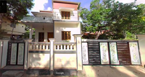 Karunagappally House | Serene Oasis Amritapuri Vavvakavu