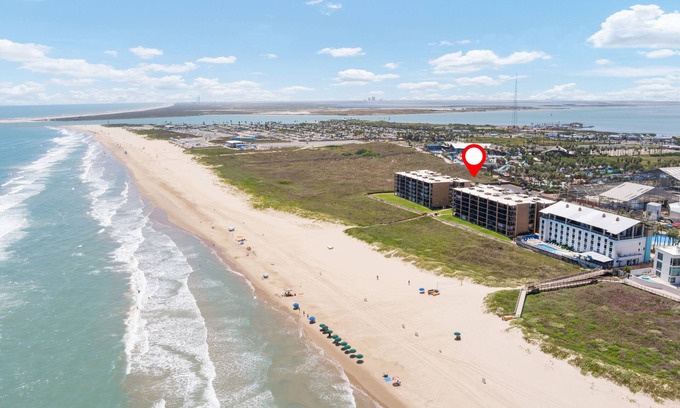 South Padre Island Condo | Serene sanctuary steps from the beach, mini-bunk bedroom, beach gear included
