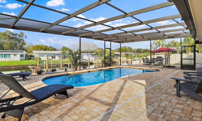 Riviera Bay House | Serenity by the Bay Waterfront HEATED POOL is an option. BOAT LIFT WITH KAYAK