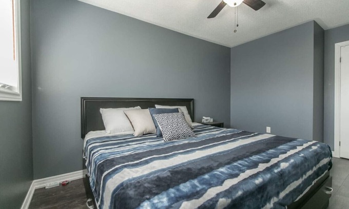Barrie House | Serenity & Style: 4BR w/Hot Tub, BBQ & Fire Table