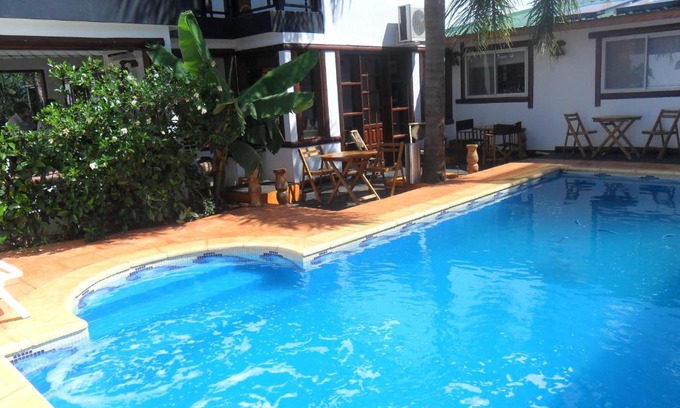 Puerto Iguazu Hotel | Si Mi Capitán - Cabañas & Habitaciones