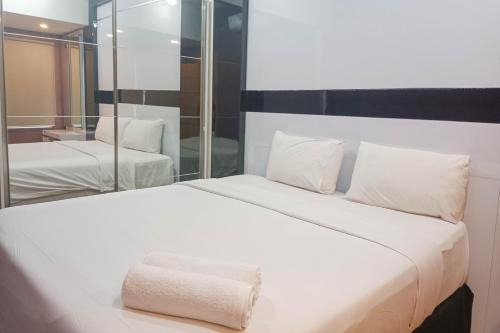 Panakkukang Apartment | Simply 1BR at 31st Floor Vida View Makassar Apartment By Travelio