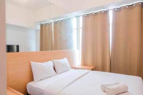 Cikokol Apartment | Simply and Homey Studio Apartment at Tree Park City By Travelio
